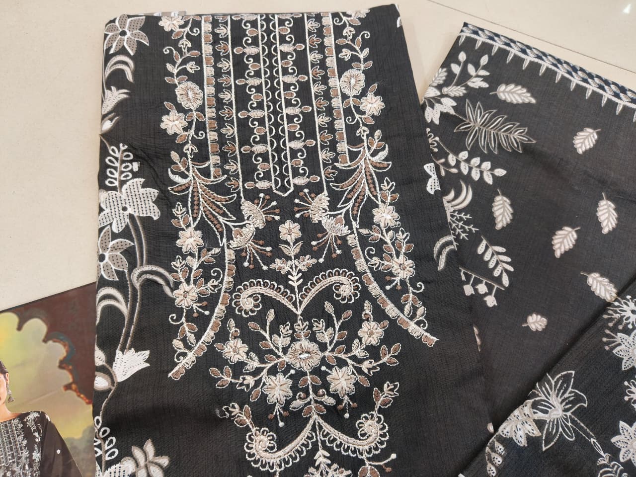 unstich embroiderd dresses matierial with black white combination